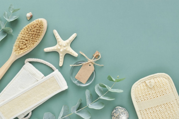 natural organic bath accessories on a green background . zero waste. body care. eco-cosmetics. flat layout, top view, a place to copy.