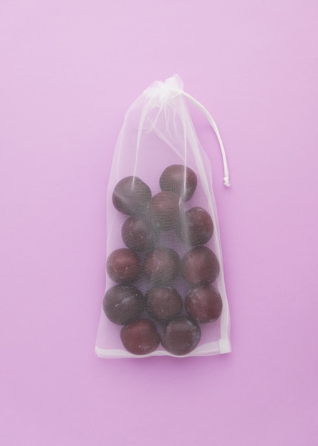 Natural Organic Plums in Shopping Net Bag Top View