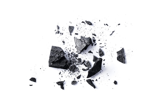 Natural organic wooden charcoal broken piece isolated on white background