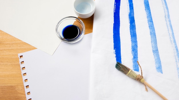 Natural paint brush and blue ink