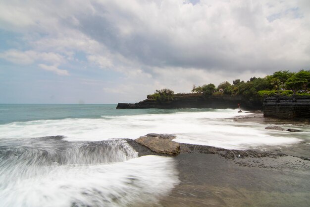 Natural panorama of Karang Bolong Island which is located in Tabanan Bali