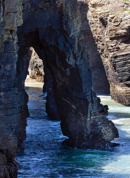 Natural rock arches on Cathedrals beach in low tide Cantabric coast Lugo Galicia Spain