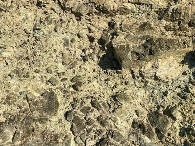 Photo natural rock background yellowish texture horizontal view