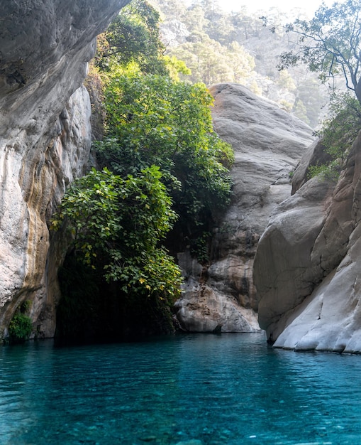 Natural rocky canyon with clear blue water in Goynuk Turkey