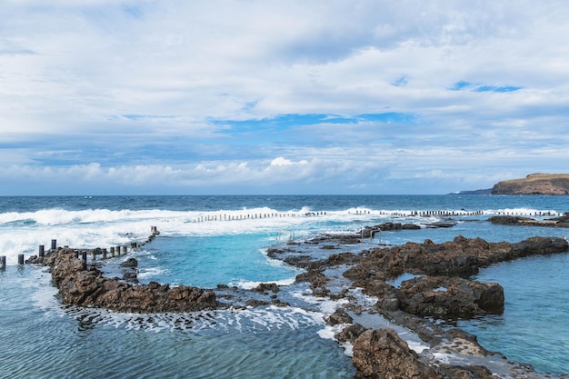 Natural saltwater pool in front of the sea