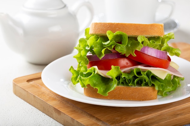 Natural sandwich Sandwich with cheese ham lettuce tomato and red onion