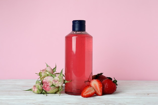 Natural shower gel and ingredients against pink