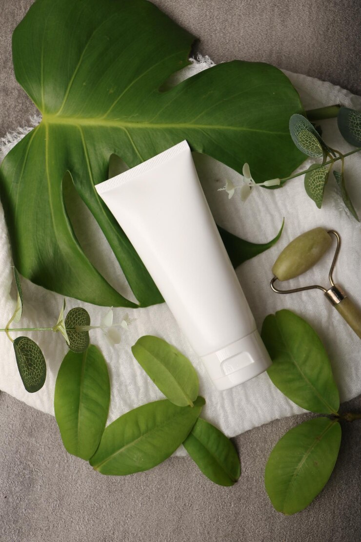Natural Skincare Tube with Green Leaves for Organic Beauty Product Photography