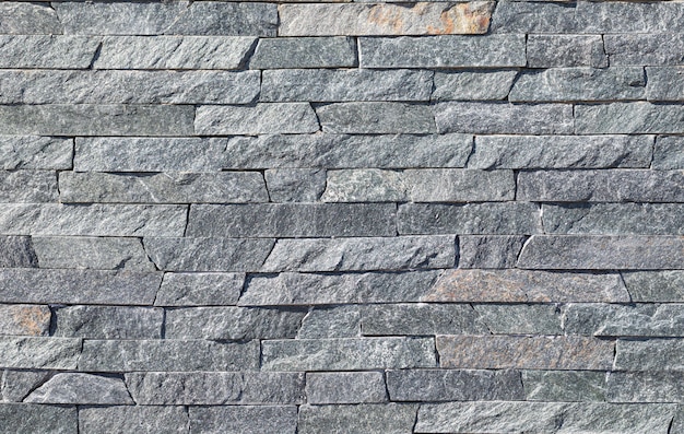 Natural slate background or texture, stone facing tile, for facade work and for interior design.