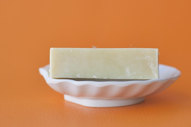 Natural soap bar on table