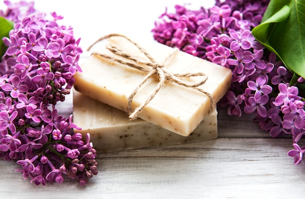 Natural soap and lilac flowers