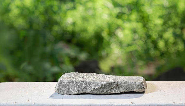 Natural stone and concrete podium in Natural green background for Empty show for packaging product p