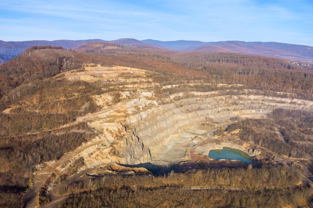 The natural stone quarry rocks in the slices of mountain