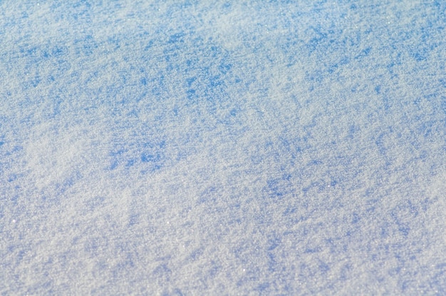 Natural winter background Snow texture in blue tone