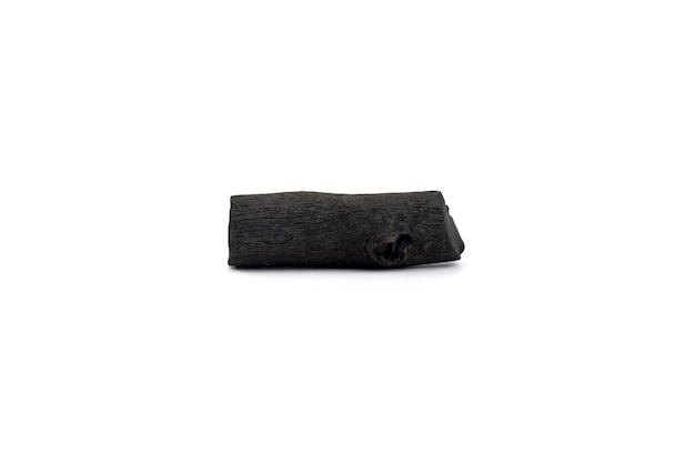 Natural wood charcoal isolated on white background. Pile of coal isolated on white background.