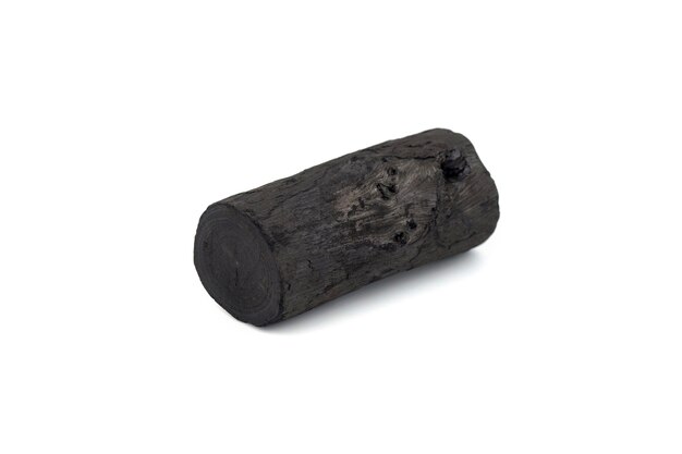 Natural wood charcoal isolated on white background. Pile of coal isolated on white background.