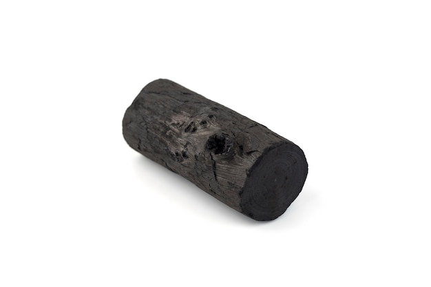 Natural wood charcoal isolated on white background. Pile of coal isolated on white background.