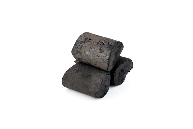 Natural wood charcoal isolated on white background. Pile of coal isolated on white background.