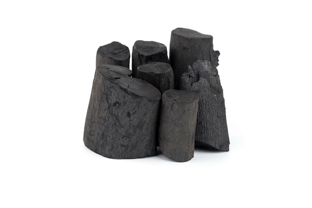 Natural wood charcoal isolated on white background Pile of coal isolated on white background