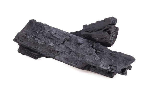 Natural wood charcoal isolated on white background