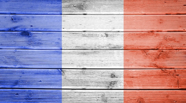 Фон текстуры натурального дерева доски с цветами флага Франции