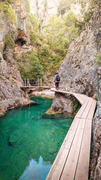 Nature Exploration Young Woman Trekking through Beceite Gorges on a Perfect Day in Teruel Aragon