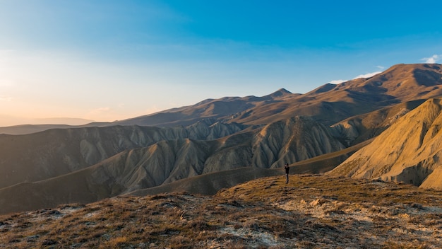 Nature photographer in mountains