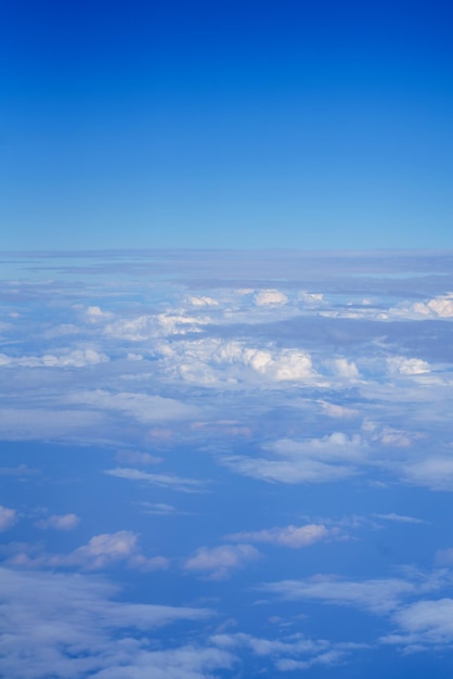 Nature view of blue sky with fluffy white cloud using for\
wallpaper page background or wallpaper