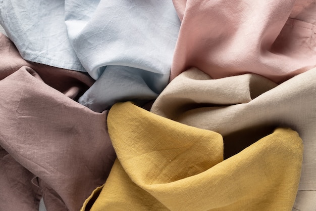 Foto natuurlijke linnen servetten in verschillende kleuren stof textuur