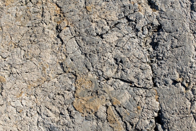 Natuurlijke rots of stenen oppervlak als achtergrondstructuur