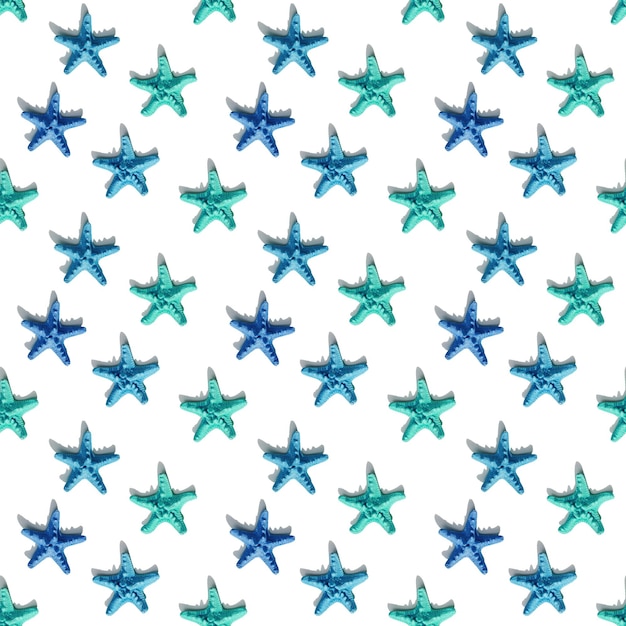 Nautic seamless pattern with blue sea stars on white Happy bright and summer mood flat lay