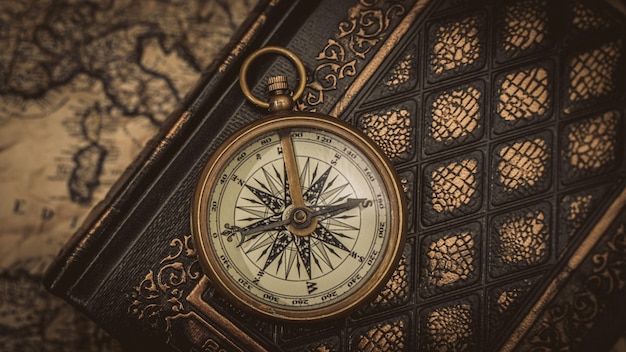 Nautical Brass Compass On Book