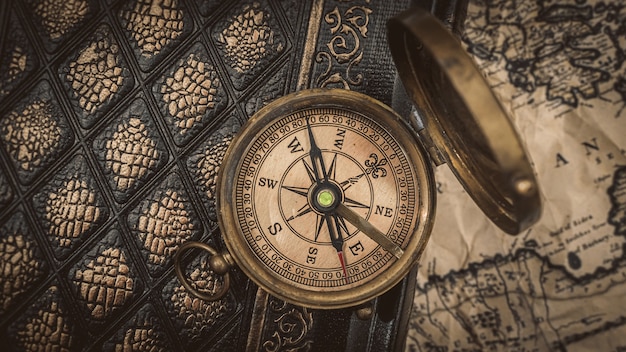 Nautical Brass Compass On Book