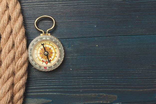 Nautical. Sailing rope with a compass