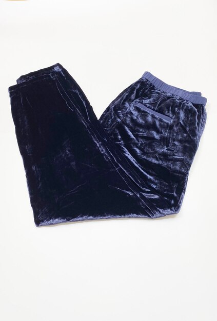 Premium Photo | Navy blue velvet pants on white