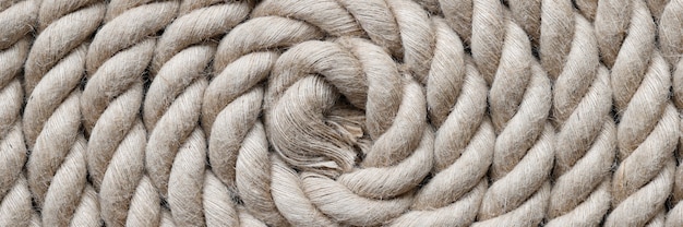 Navy rope folded in circle closeup background top view