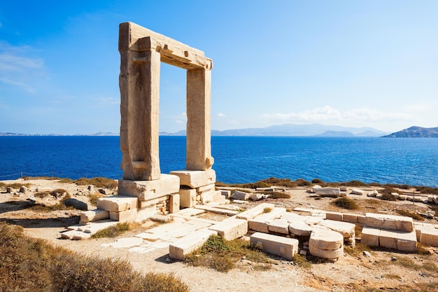 Naxos Portara or Apollo Temple entrance gate on Palatia island near Naxos island in Greece