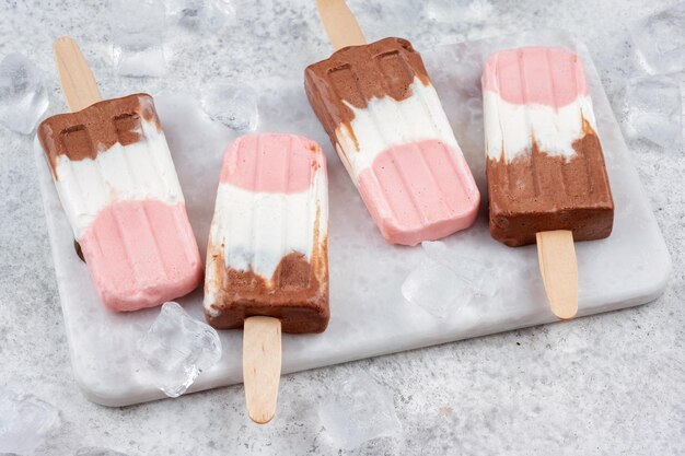 Neapolitan yogurt ice cream popsicle