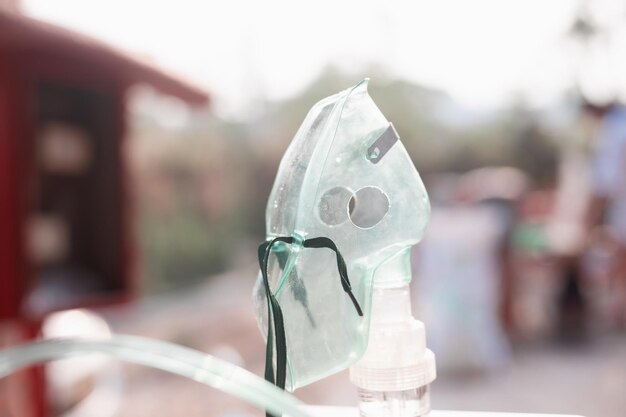 Nebulizer on blur background oxygen mask inhaler peak flow meter spacer nebula antiinflammatory drugs to manage asthma Bronchial asthma concept