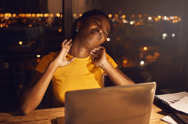 Photo neck pain studying hard and work stress of a young female student working late for a test or exam stressed tired and anxious preteen girl work at night on a school study class project inside