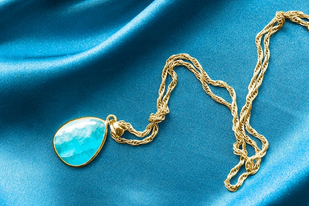 Necklace on blue satin