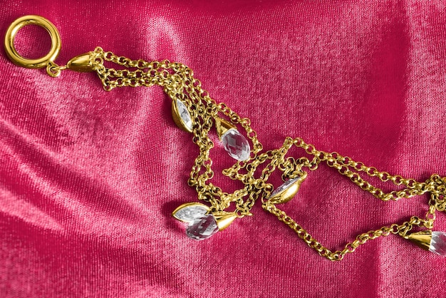 Necklace on pink silk