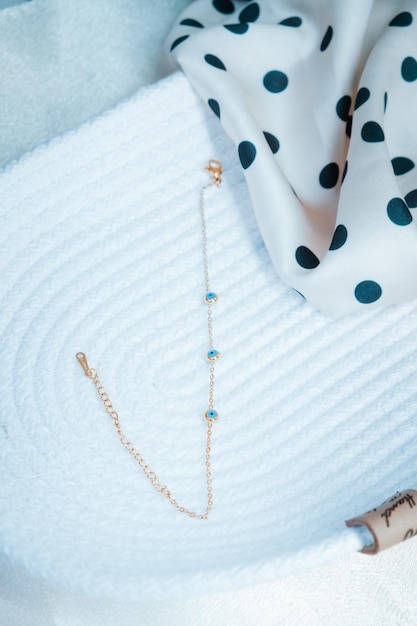 a necklace with blue and green beads on it