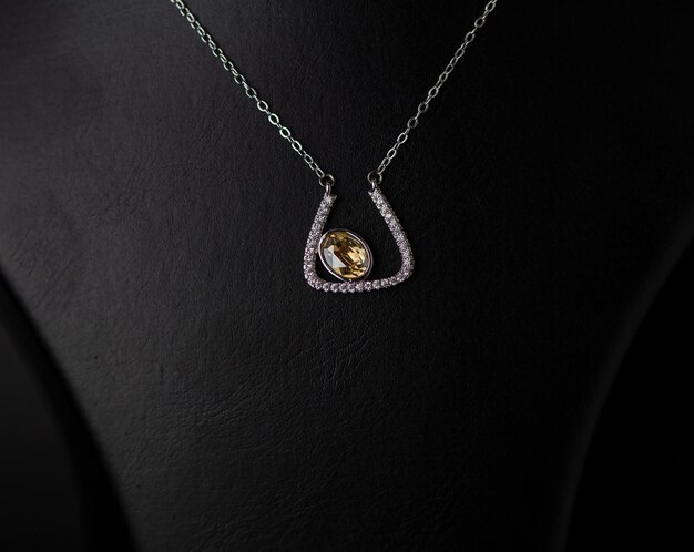  necklace with diamond stone isolated black background