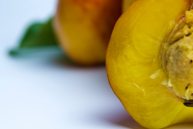 Nectarine closeup half juicy nectarine on a white background