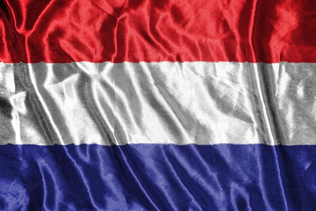 Foto nederland doek vlag satijn vlag zwaaien stof textuur van de vlag