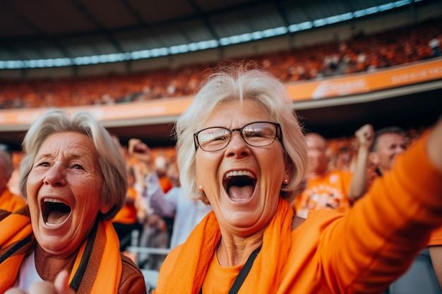 Nederlandse vrouwelijke voetbalfans in een WK-stadion ter ondersteuning van het nationale team