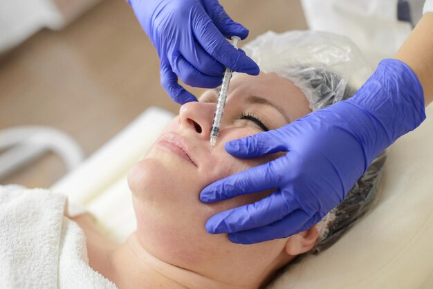 Needle mesotherapy in beauty spa salon or clinic