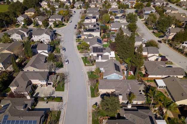 A neighborhood with a solar panel on the roof