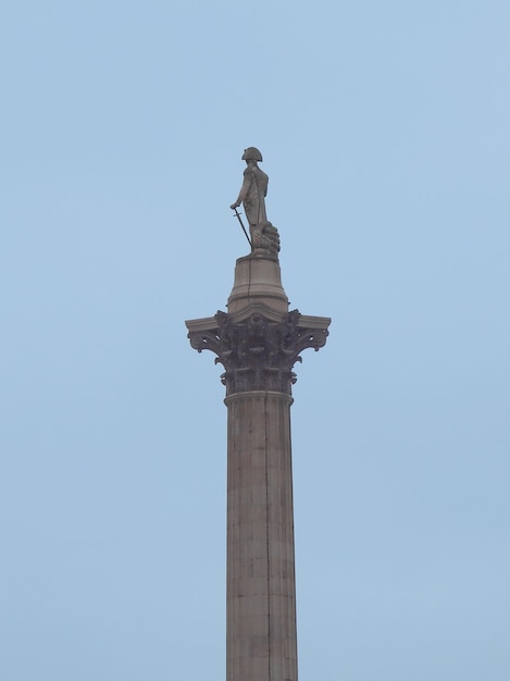 Nelson Column monument in Trafalgar Square London UK